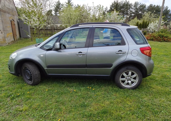 Suzuki SX4 cena 34500 przebieg: 135140, rok produkcji 2013 z Szczecinek małe 211